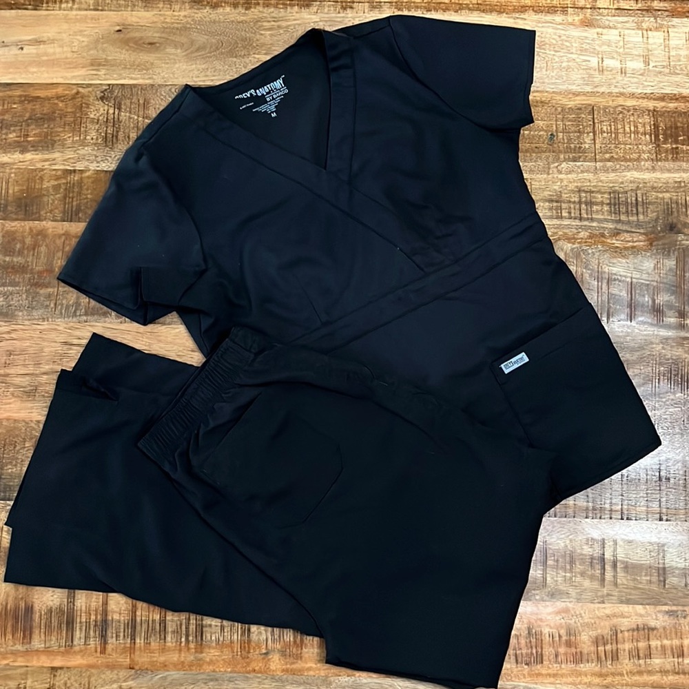 Grey’s Anatomy medical scrubs woman’s size Top is M, Bottoms are Small.